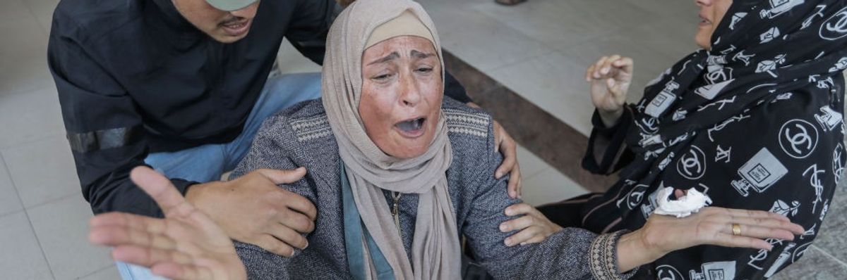 Woman in Gaza cries out amid Israeli assault