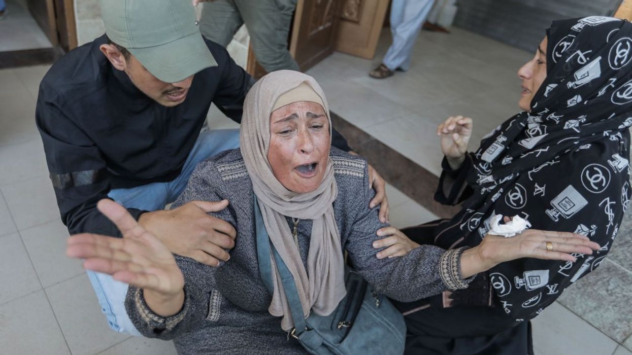 Woman in Gaza cries out amid Israeli assault
