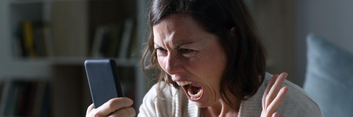 Woman screaming at smart phone