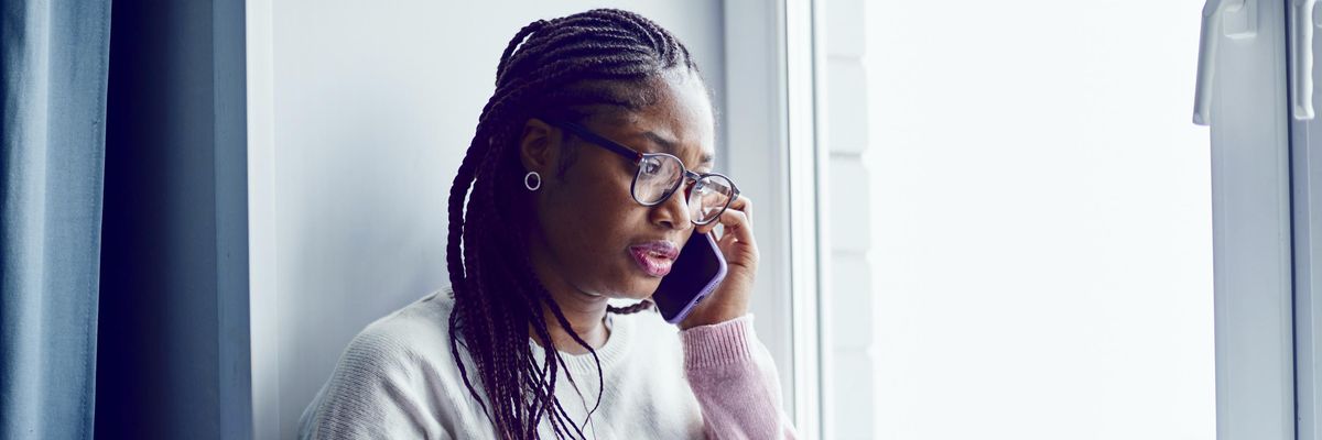 Woman talks on phone