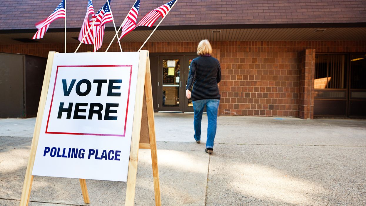 Woman Voter Entering Voting Polling Place for USA Government Election