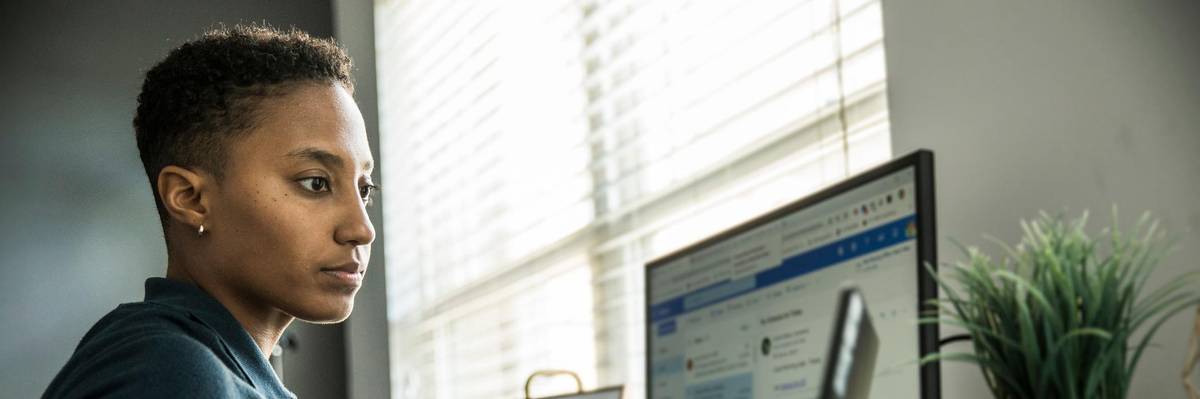 Woman works on laptop