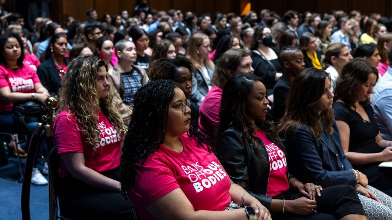 Women fill the room during a Senate hearing