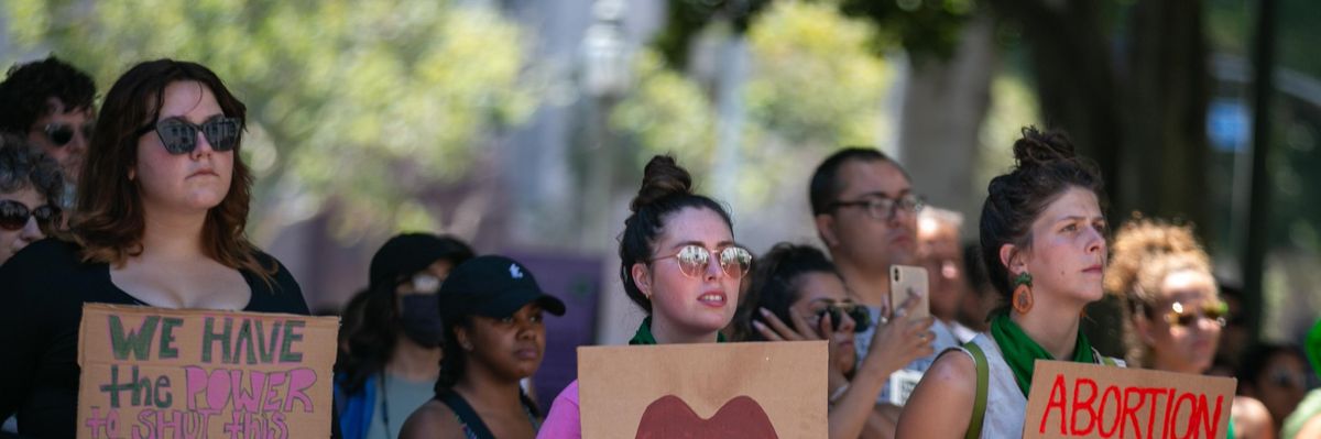 Women's rights protesters rail against the Supreme Court