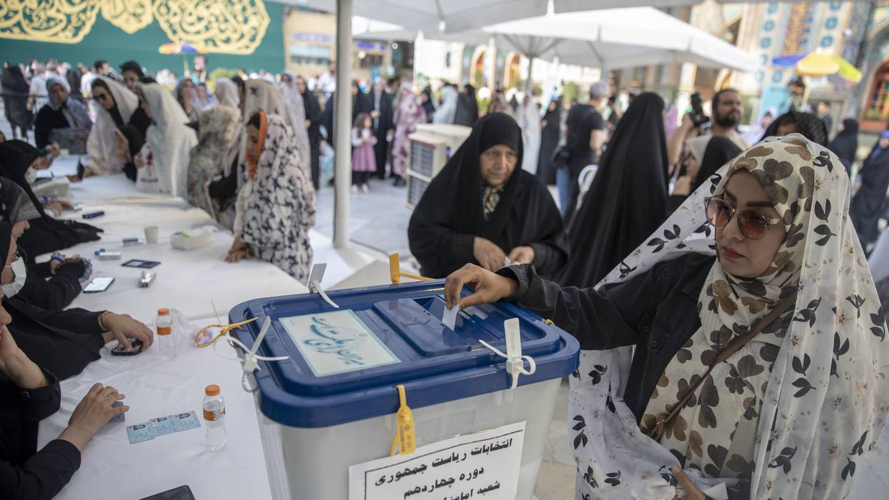 Women vote in Tehran.