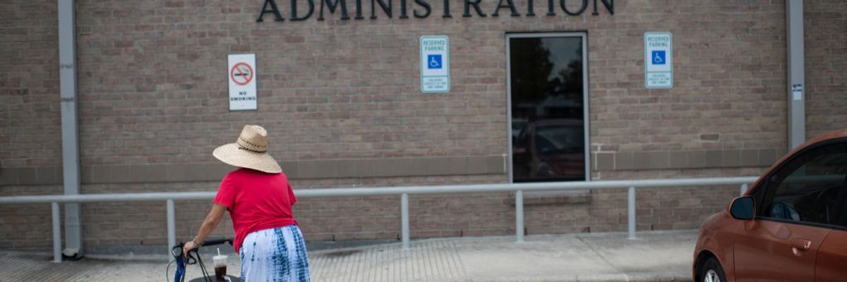 Women walking into Social Security office