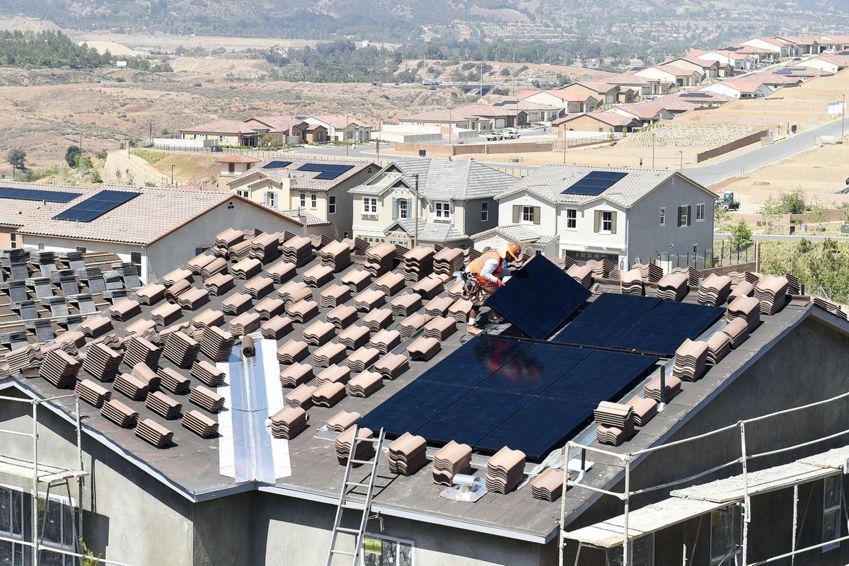 https://www.commondreams.org/media-library/workers-install-solar-panels-on-the-roof-of-a-home-in-corona-california-on-may-3-2018-photo-will-lester-inland-valley-daily.jpg?id=32140517&width=1200&height=800&quality=90&coordinates=79%2C0%2C79%2C0