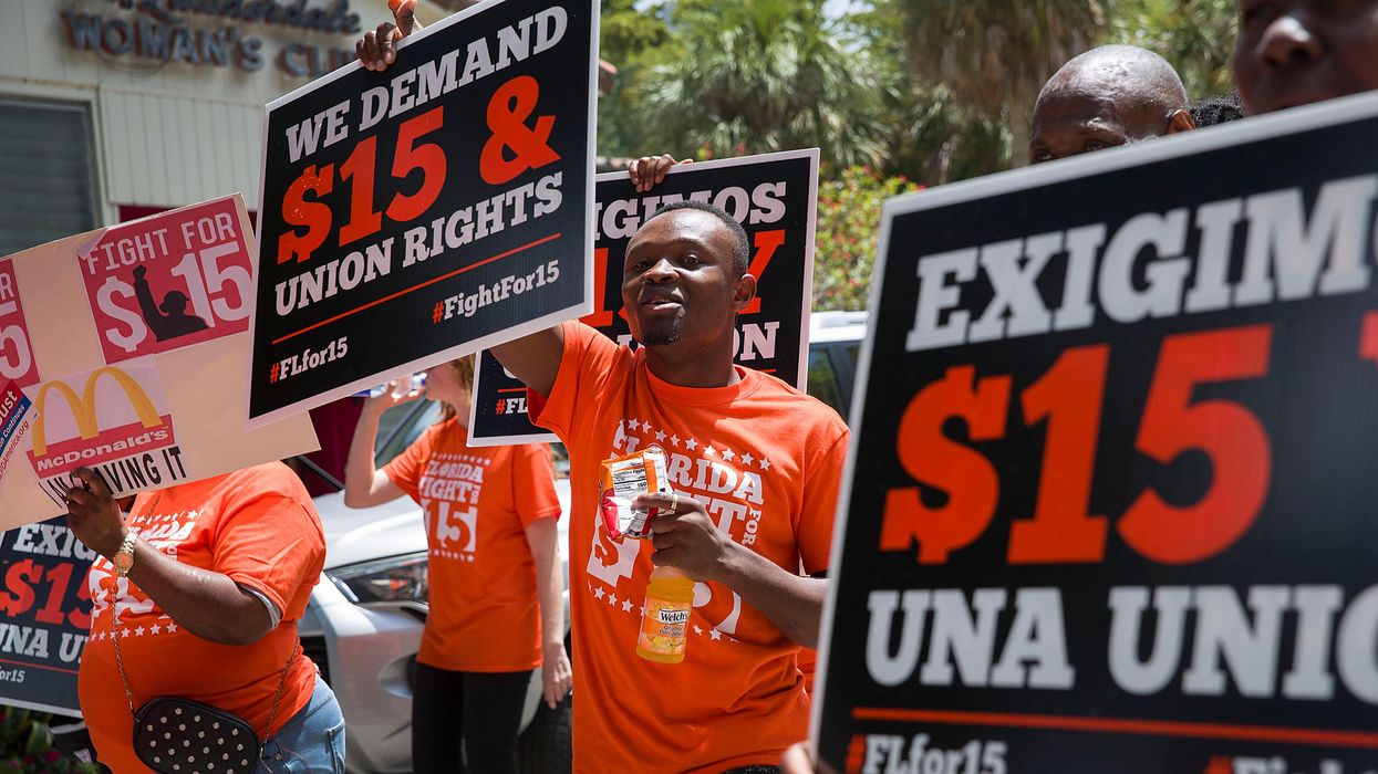 Workers rally for a $15 federal minimum wage