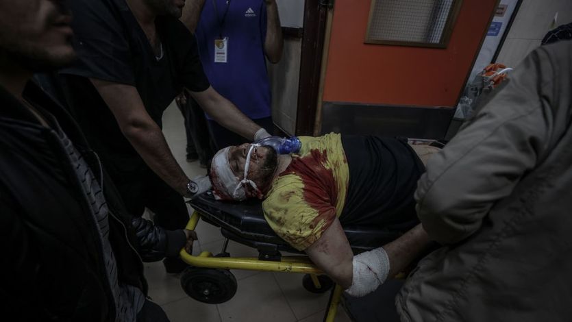 Wounded man in Gaza by Israeli bombing