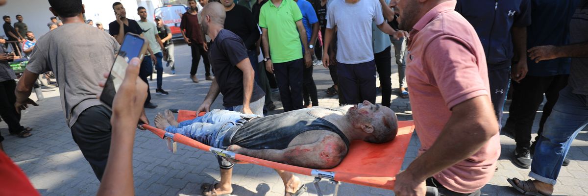 Wounded Palestinians are brought to Al-Ahli Baptist Hospital