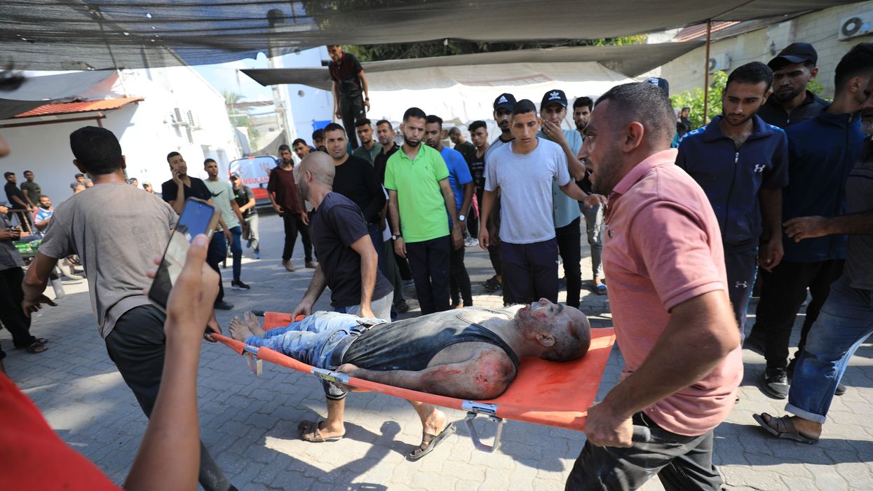 Wounded Palestinians are brought to Al-Ahli Baptist Hospital