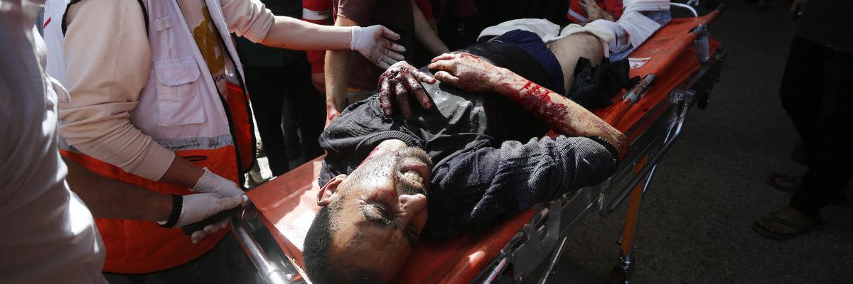 Wounded Palestinians are brought to al-Aqsa Martyrs Hospital