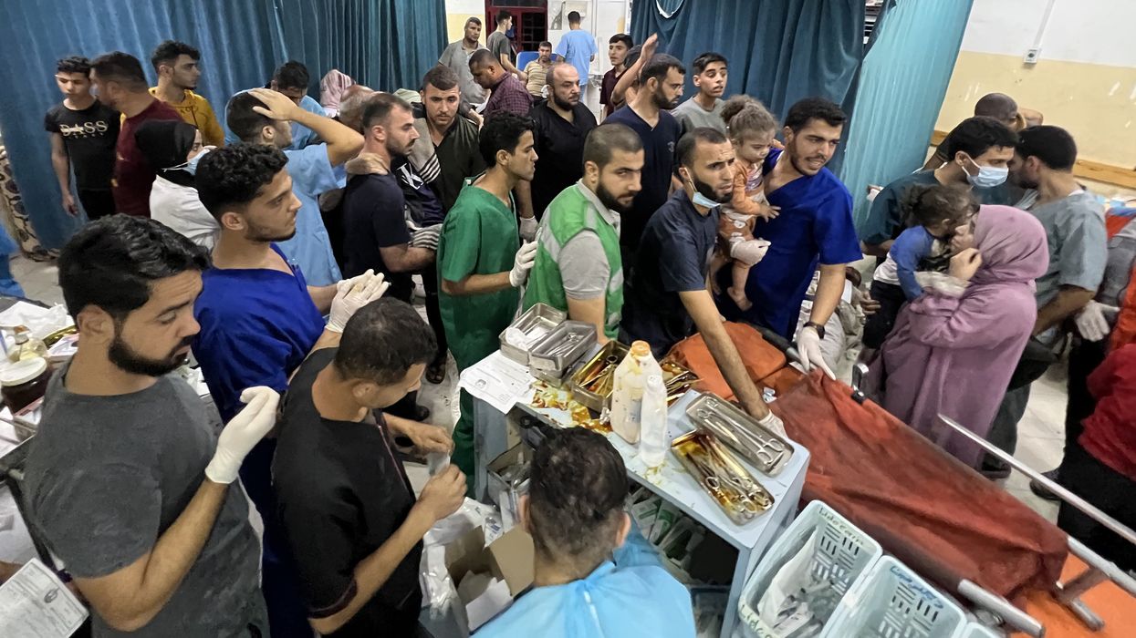Wounded people receive treatment at the Aqsa Indonesia Hospital