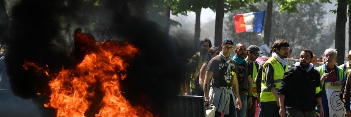 Yellow Vests Demonstrate in Paris as Notre Dame Donations Highlight Wealth Inequality