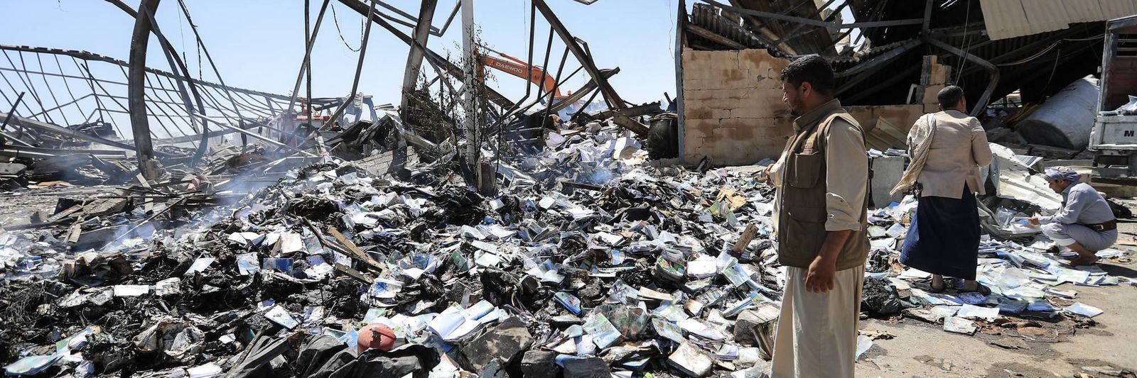 yemeni-men-assess-damage-from-saudi-strike.jpg?id=68410268&width=1200&height=400&coordinates=0%2C267%2C0%2C400