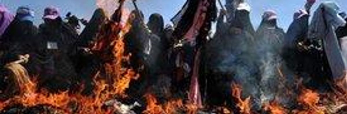 Yemeni Women Set Veils Ablaze in Protest at Saleh Crackdown