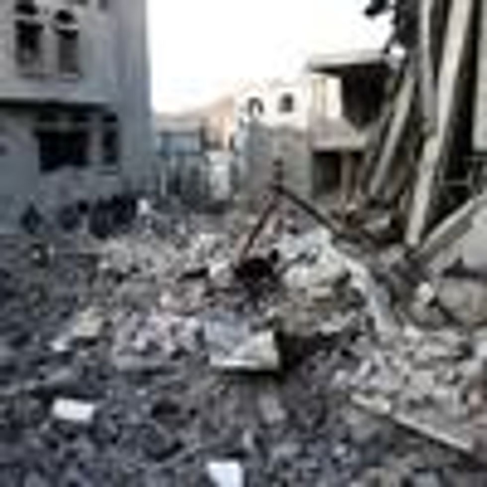 Yemenis inspect the scene of aerial attacks said to be carried out by aircraft of the coalition led by Saudi Arabia on January 18, 2022 in Sana'a, Yemen.