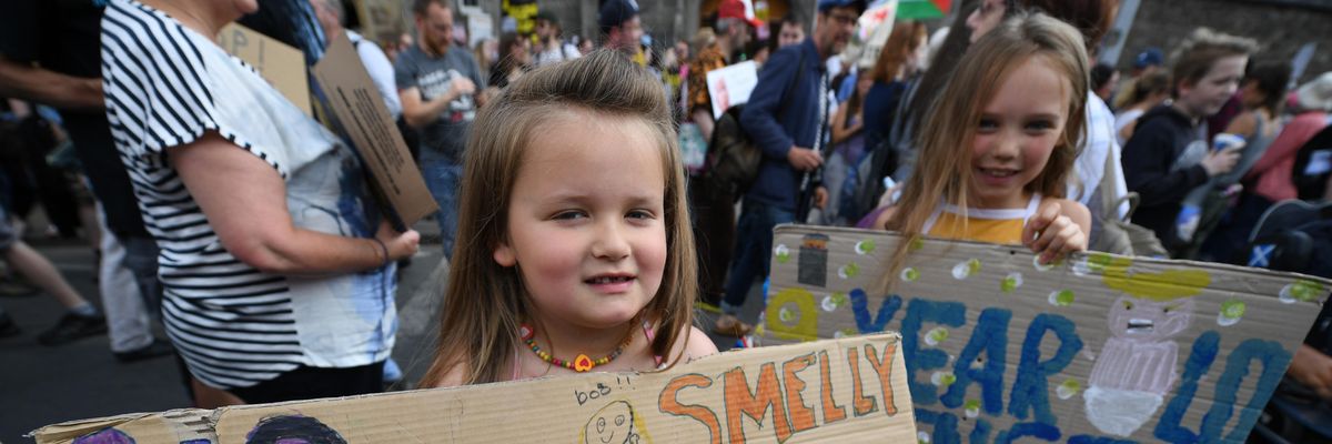 Scottish Protesters Greet 'Tiny-Fingered, Cheeto-Faced, Ferret-Wearing Shitgibbon' Trump with Even Better Signs Than English