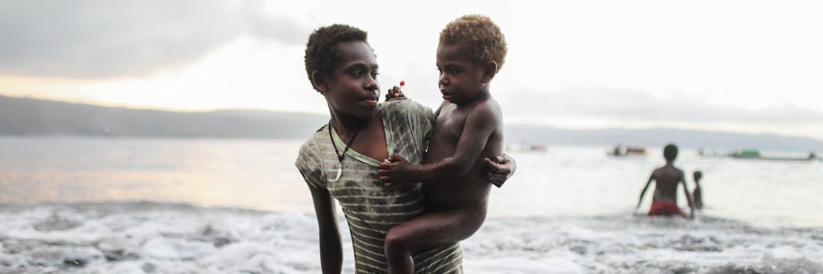 Young villagers play in the Pacific Ocean in the village of Waisisi on December 3, 2019 in Tanna, Vanuatu. 25 percent of Vanuatu's 276,000 citizens lost their homes when Cyclone Pam, a category 5 storm, devastated the South Pacific archipelago of 83 islands in 2015. (Photo: Mario Tama/Getty Images)