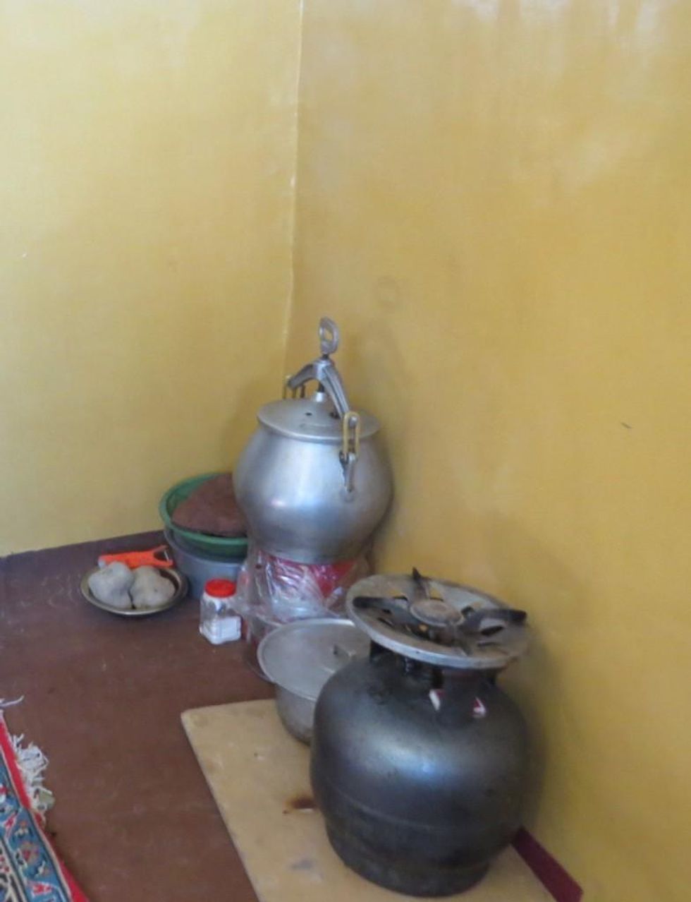 Zuhair's kitchen in a corner of the single, multipurpose room