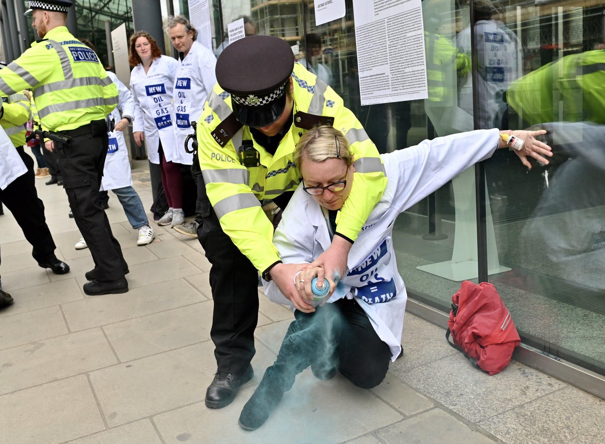 Scientists Glue Hands to UK Business Dept. Demanding End to 'Fossil Fuel Madness'