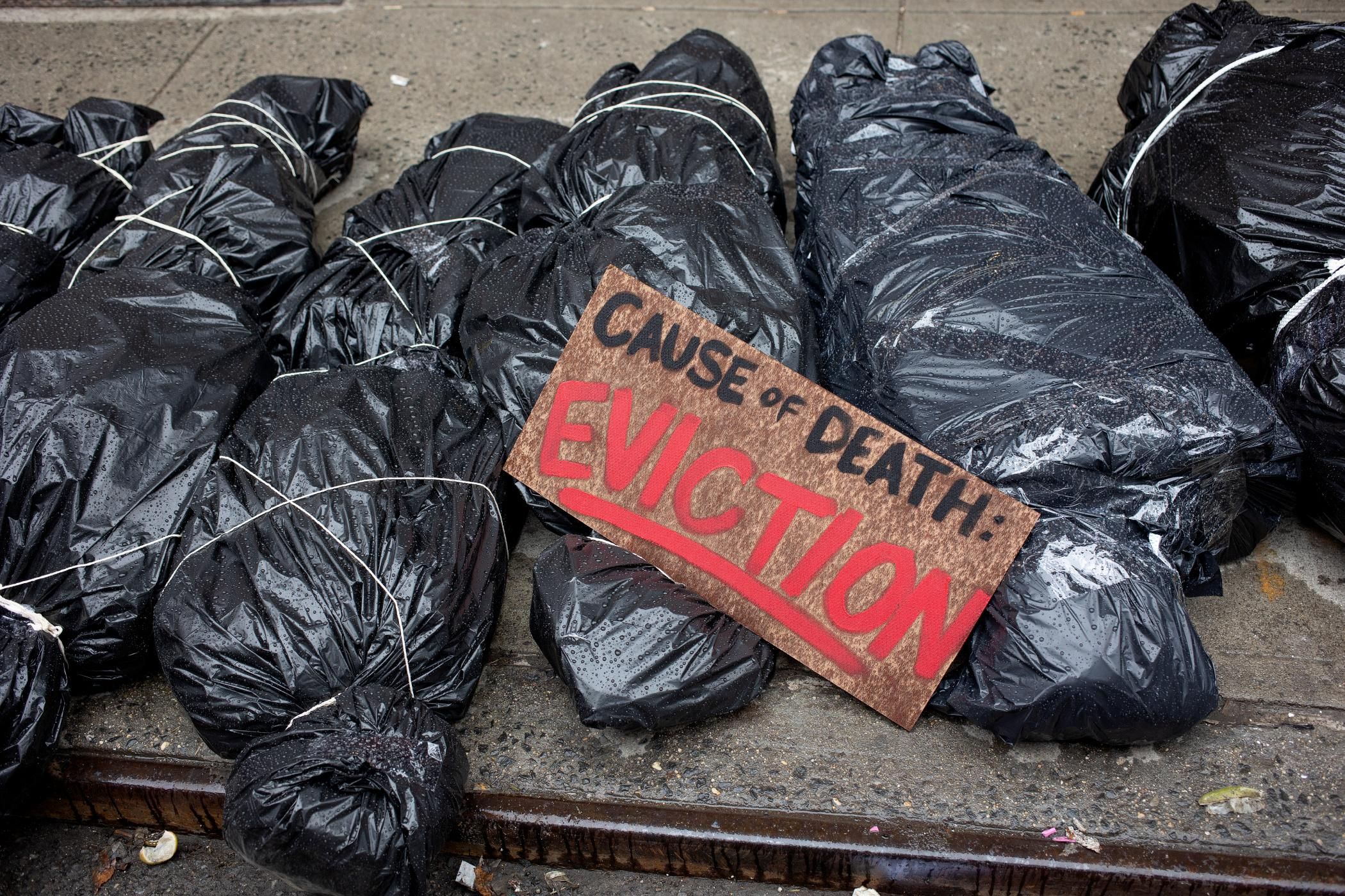 Tenant rights activists protesting inadequate relief for renters during the Covid-19 pandemic leave prop bodies outside the home of New York State Senator Brian Kavanagh on February 28, 2021 in the East Village neighborhood of New York City. (Photo: Andrew Lichtenstein/Corbis via Getty Images)