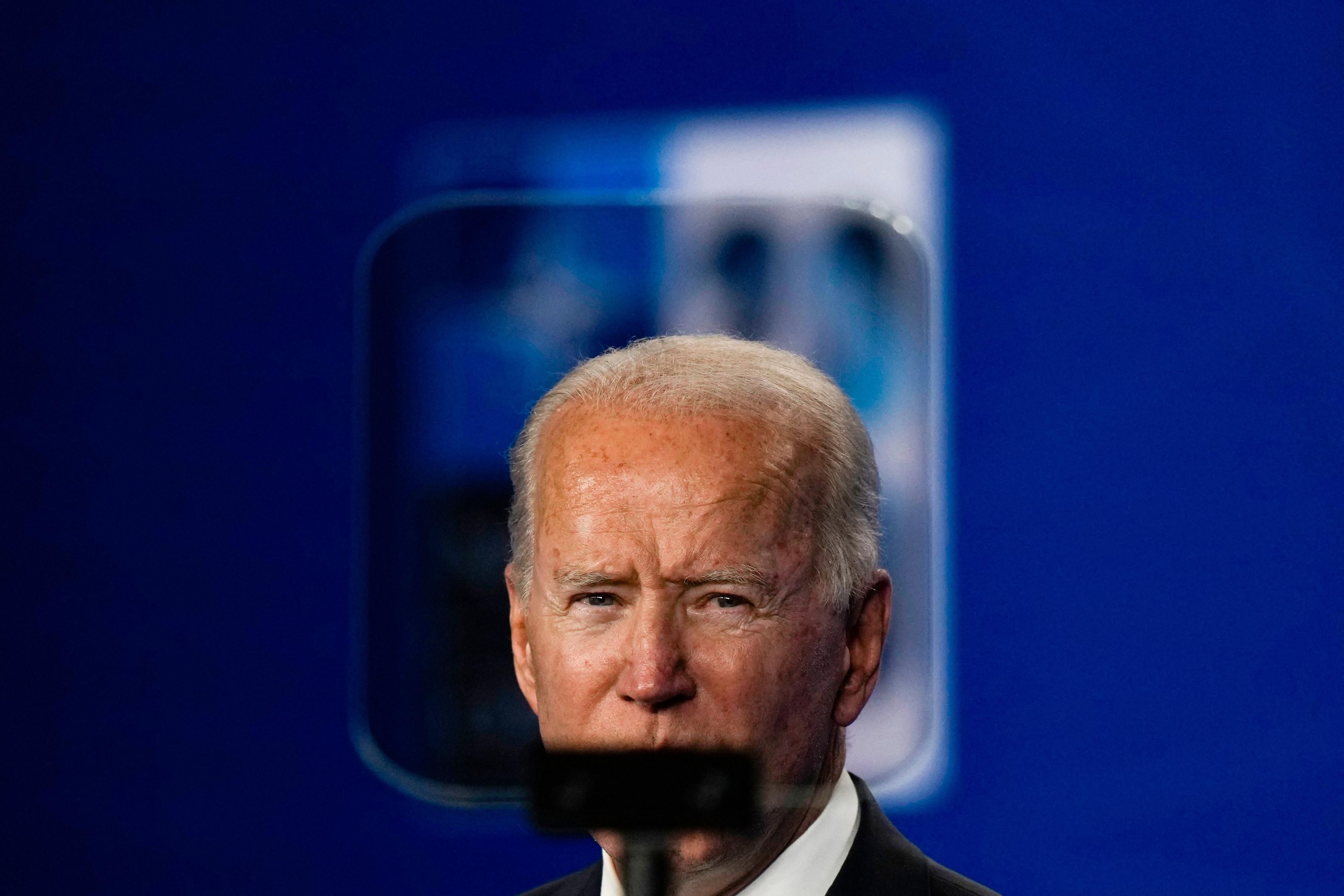 President Joe Biden speaks at a press conference