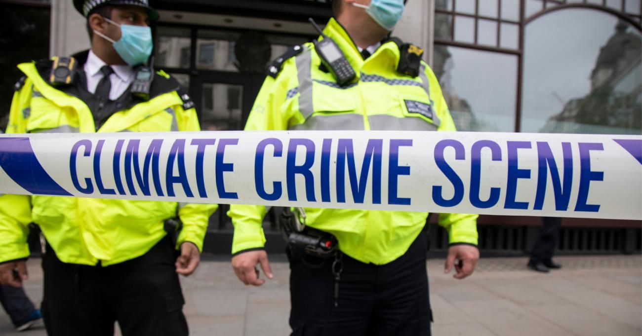 Climate crime scene tape at an Extinction Rebellion protest
