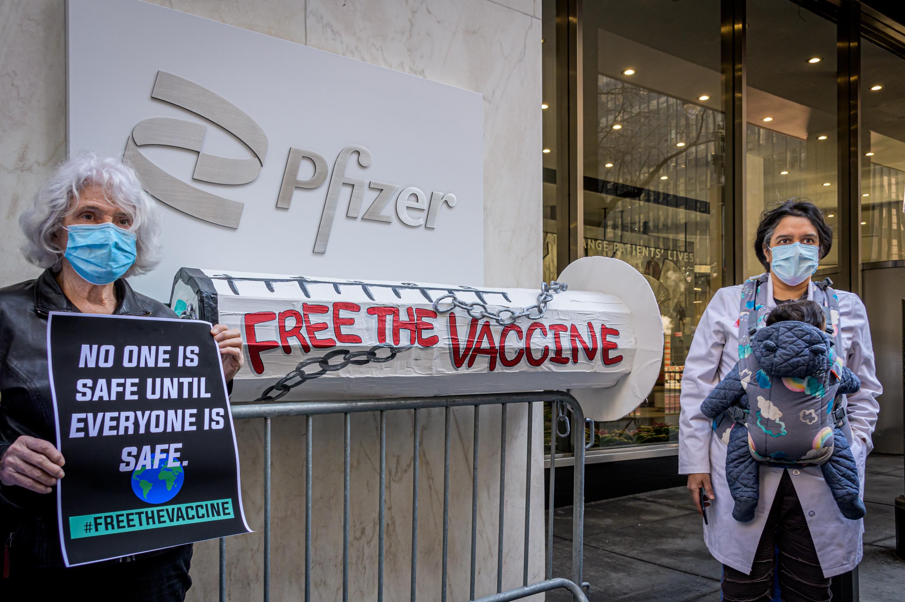 Health justice advocates gathered outside Pfizer Worldwide Headquarters in Manhattan on March 11, 2021, where they called on the pharmaceutical giant to share Covid-19 vaccine formulas and transfer technology to boost the global manufacturing of doses in the face of massively unequal distribution. (Photo: Erik McGregor/LightRocket via Getty Images)