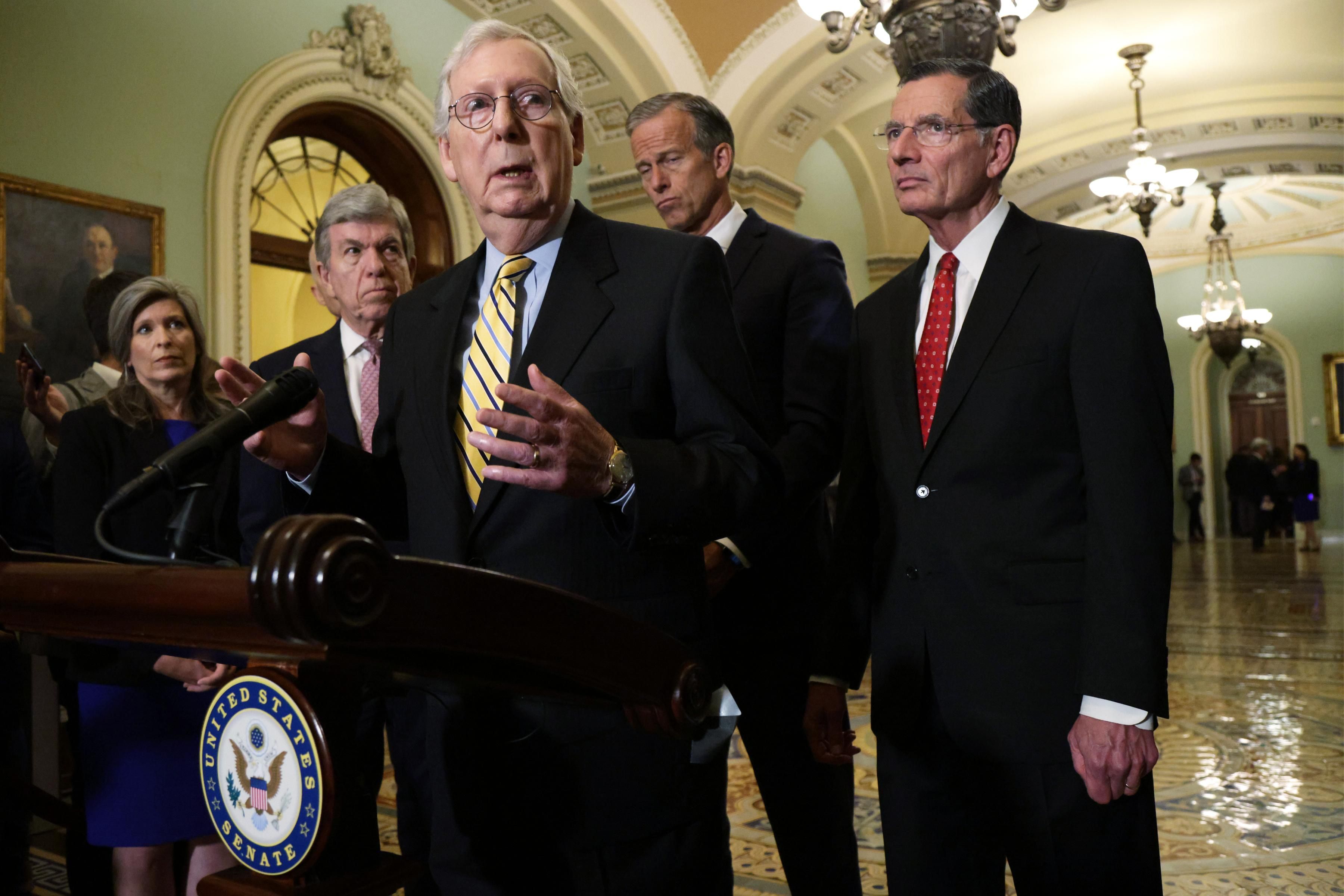 Senate Minority Leader Mitch McConnell speaks at a press conference