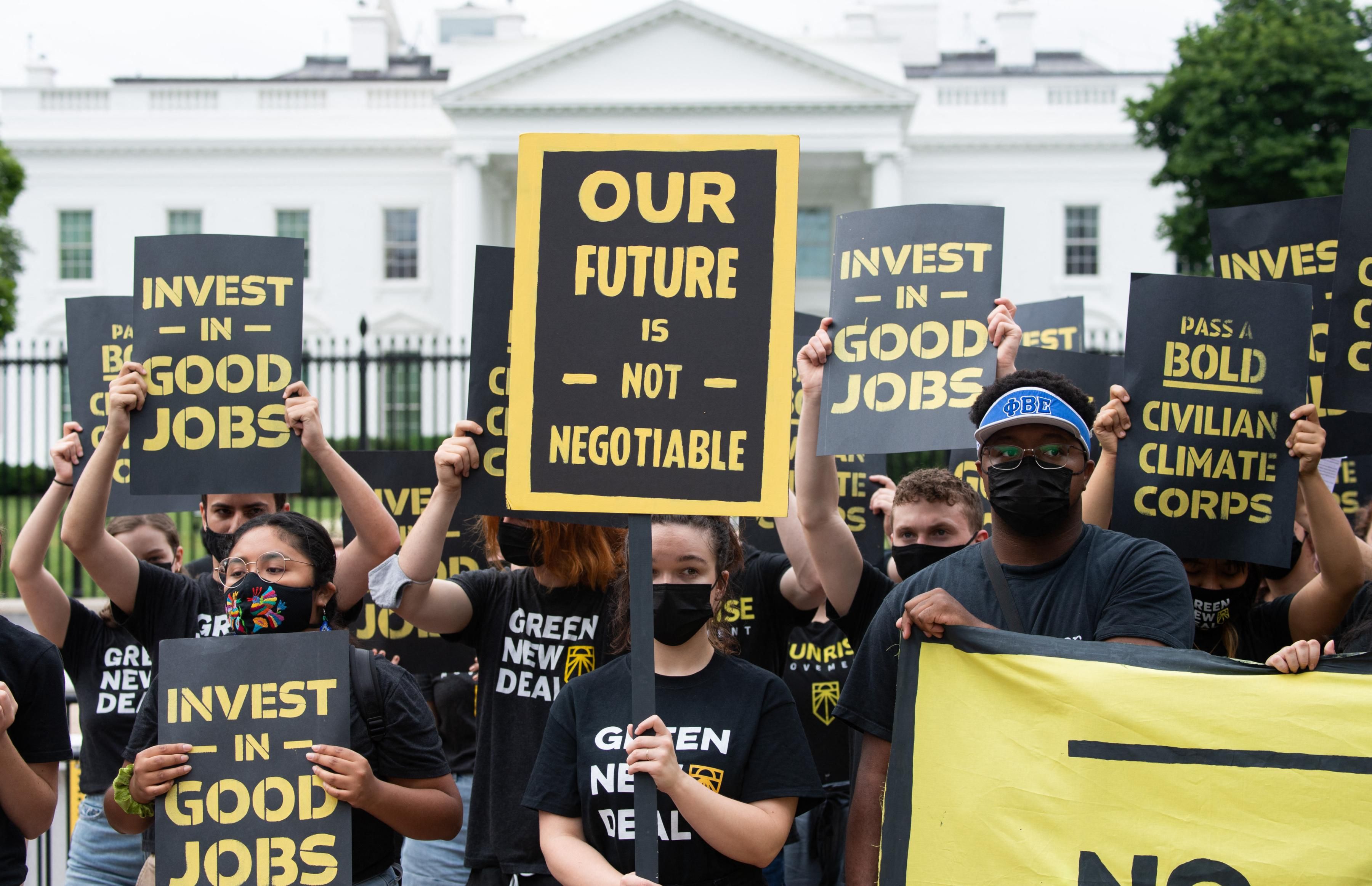 Sunrise Movement activists protest in front of the White House