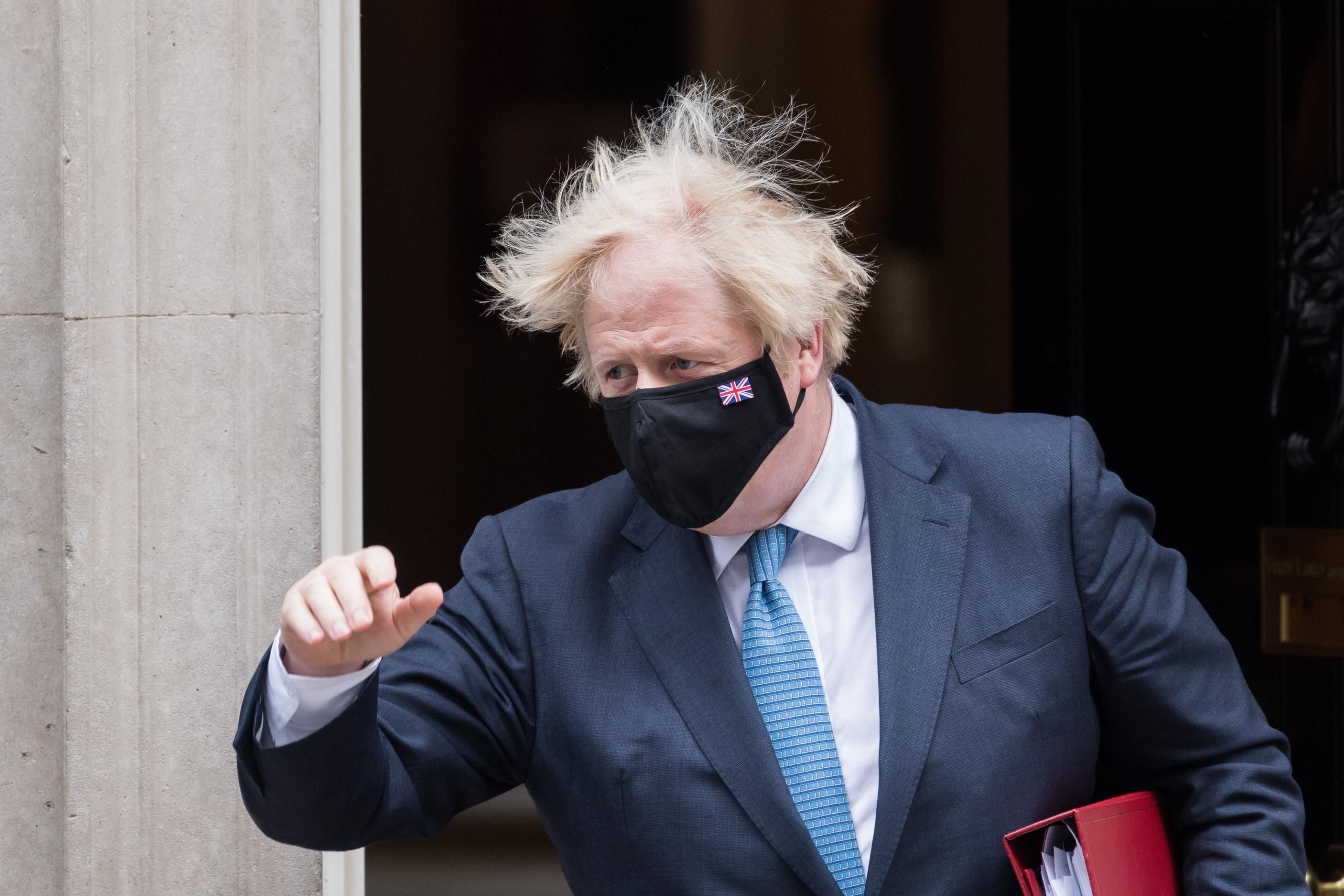 British Prime Minister Boris Johnson leaves 10 Downing Street for a press conference at the House of Commons on July 14, 2021 in London, England. (Photo: Wiktor Szymanowicz/Barcroft Media via Getty Images)