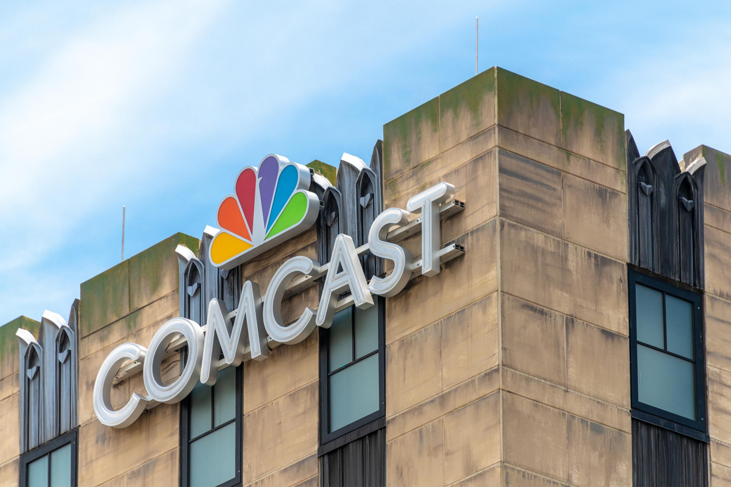 Comcast's logo is seen on the wall of a building at Universal Studios in Orlando, Florida. (Photo: Roberto Machado Noa/LightRocket via Getty Images)