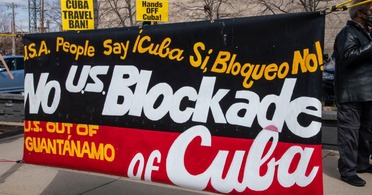 "No US Blockade of Cuba" sign at a protest