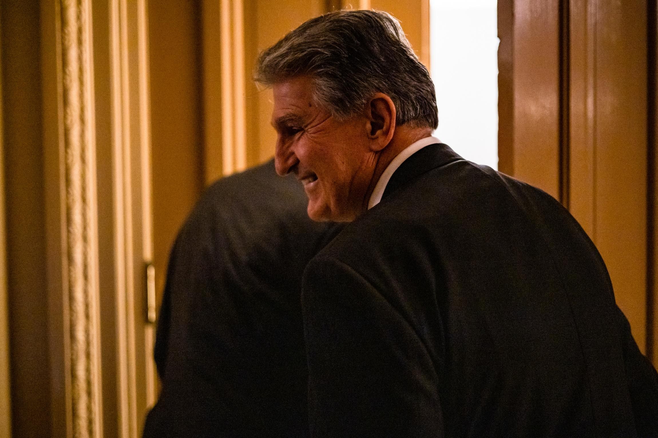 Sen. Joe Manchin (D-W.Va.) returns to the room where a bipartisan group of senators and White House officials are holding negotiations over the Biden administration's proposed infrastructure plan at the U.S. Capitol on June 23, 2021 in Washington, D.C. (Photo: Samuel Corum via Getty Images)