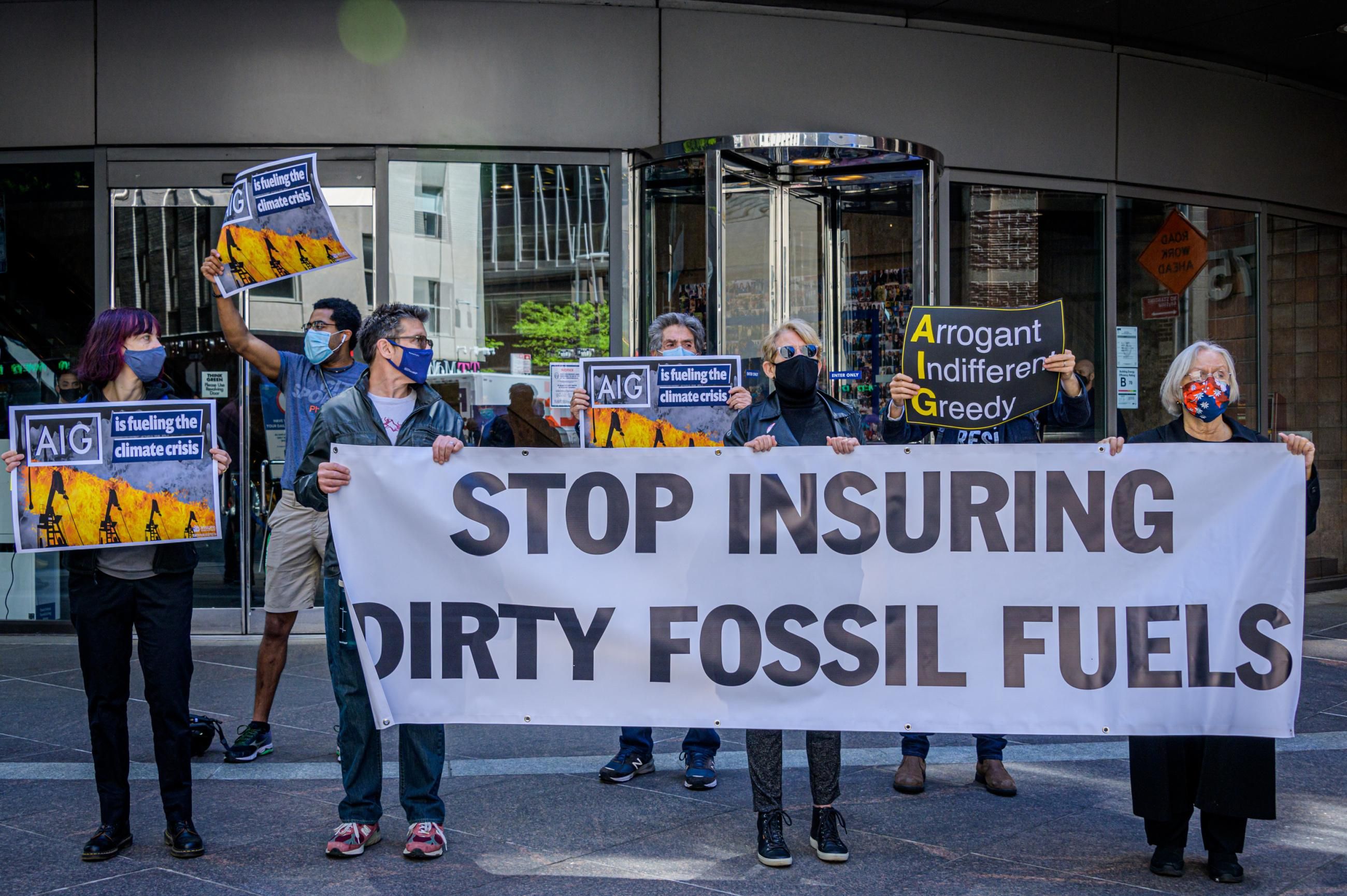 A group of activists, working with the Insure Our Future Network, gathered outside AIG headquarters in Manhattan during their annual shareholder meeting on May 12, 2021 to demand that AIG take action to address the climate crisis. (Photo: Erik McGregor/LightRocket via Getty Images)