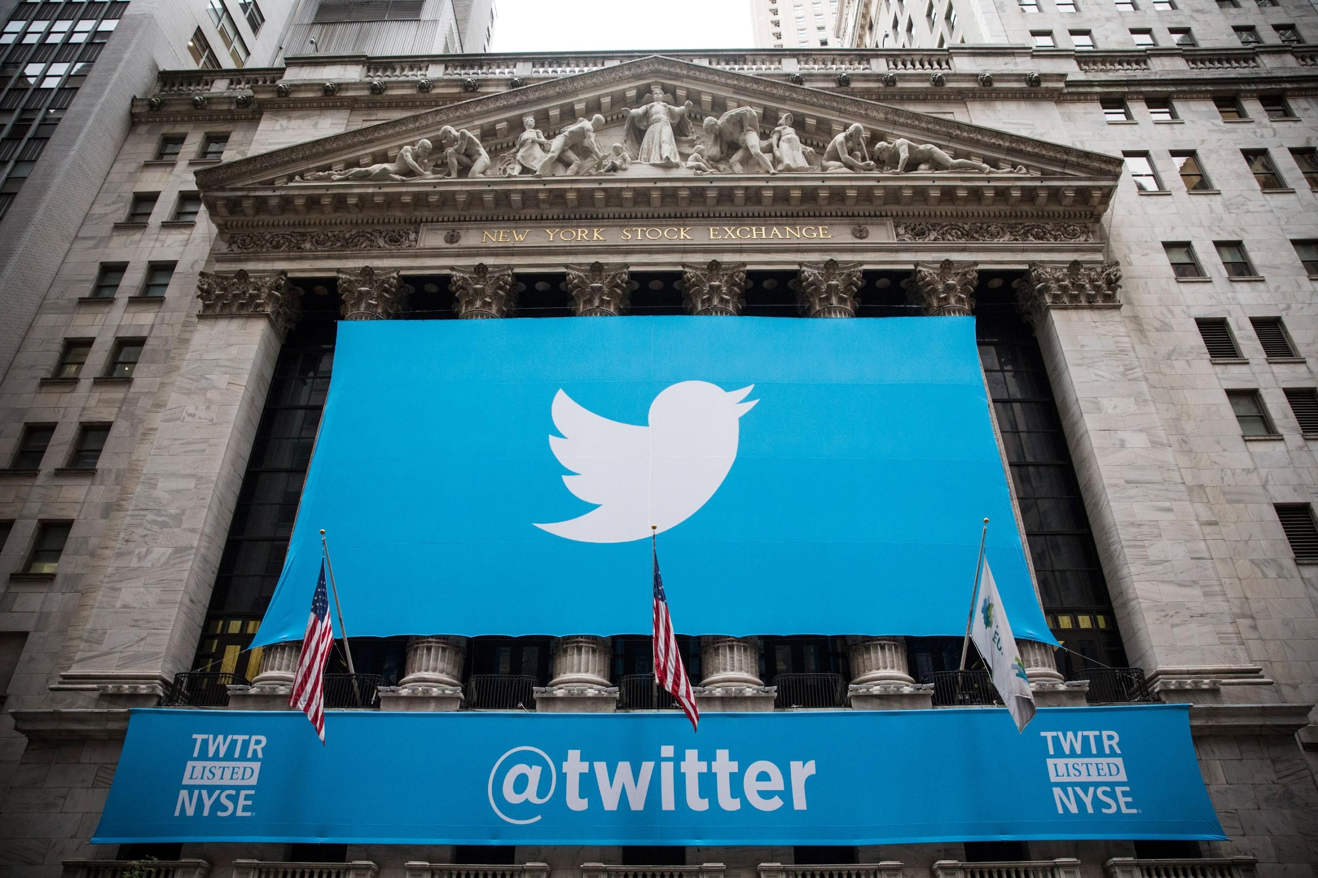 The Twitter logo is displayed on a banner outside the New York Stock Exchange on November 7, 2013 in New York City. (Photo: Andrew Burton via Getty Images)