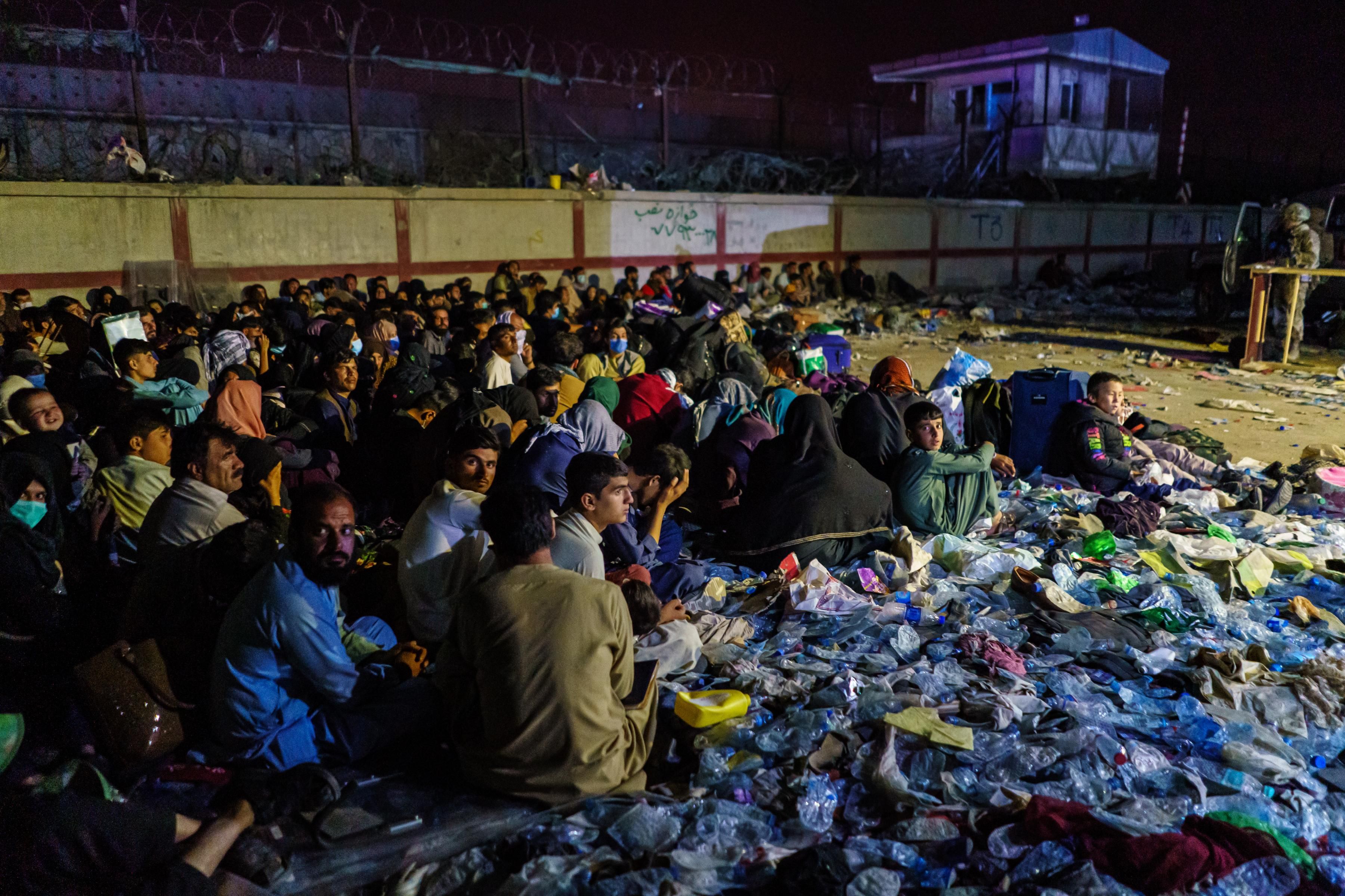 Afghan refugees wait in Kabul