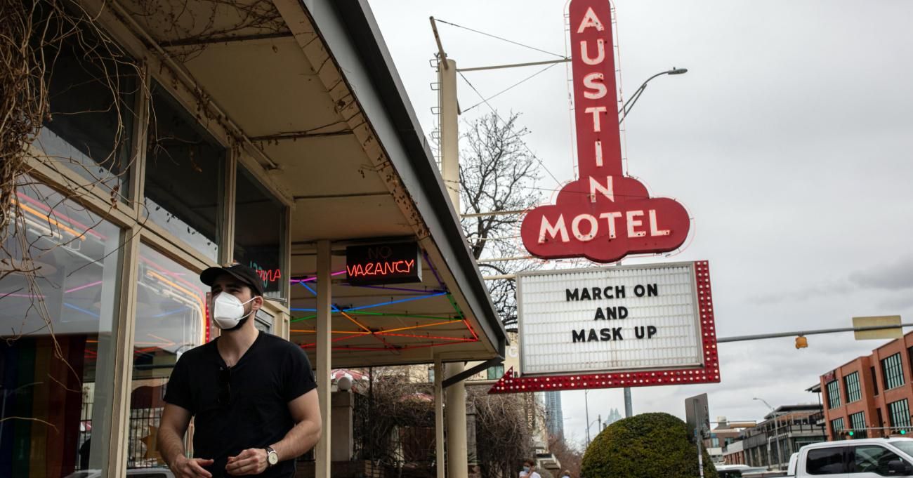 The Austin Motel displays a sign encouraging mask-wearing.