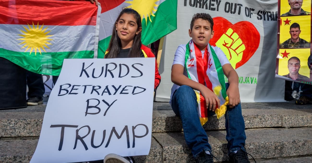 Kurdish children at a protest against Donald Trump.