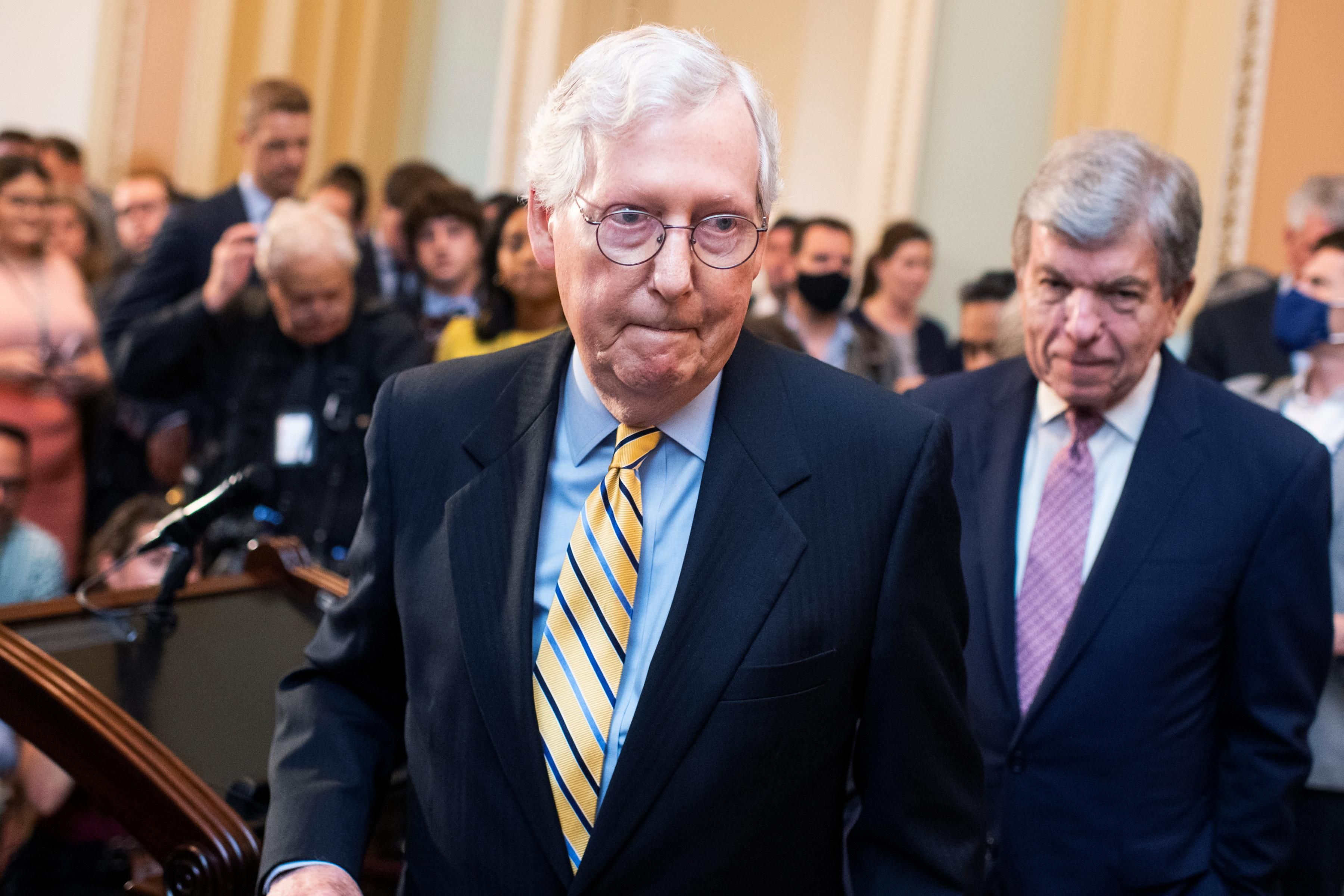 Senate Minority Leader Mitch McConnell and Sen. Roy Blunt leave a news conference