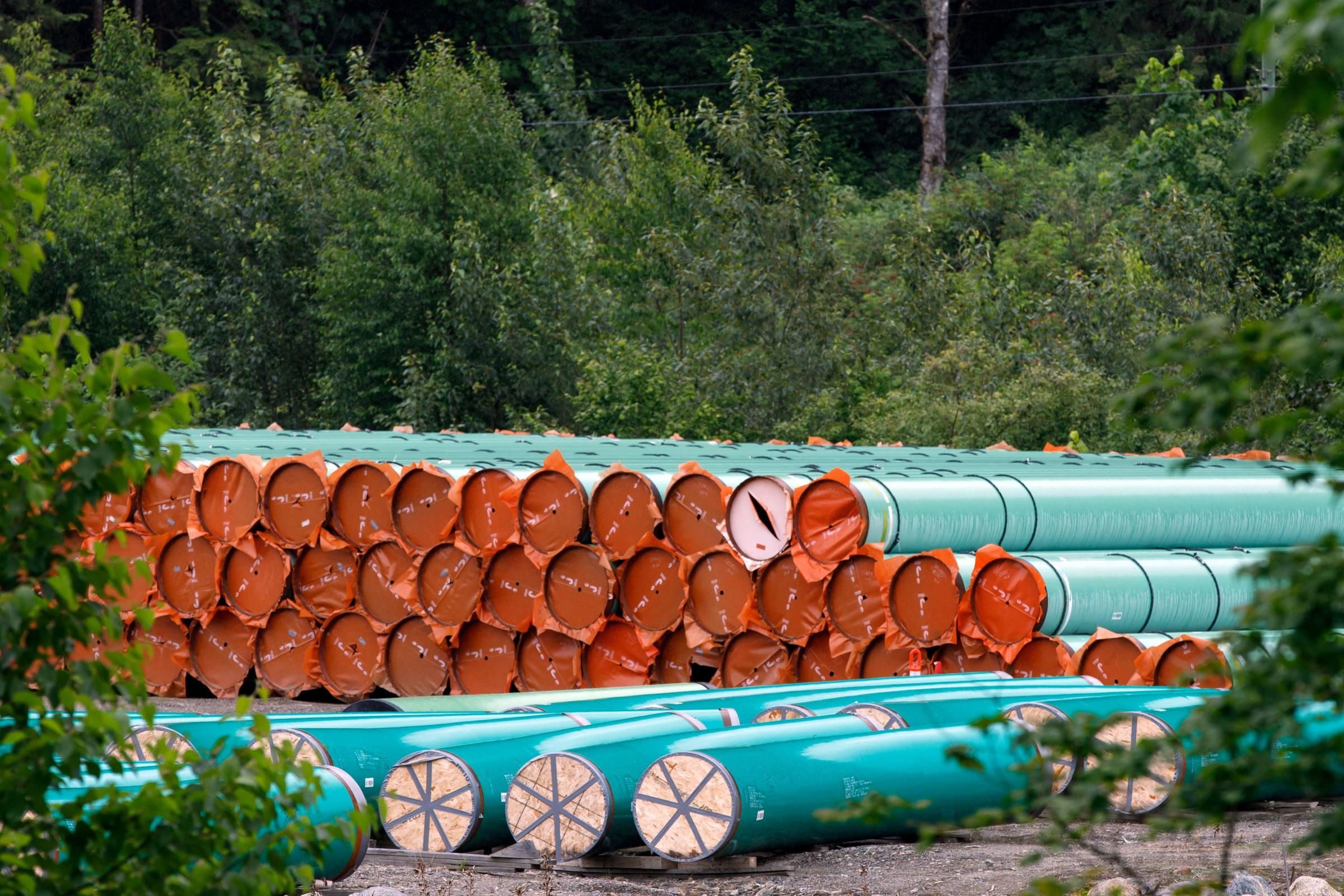 Materials for the Trans Mountain pipeline project sit in a storage lot outside British Columbia on June 6, 2021. (Photo: Cole Burston/AFP via Getty Images)