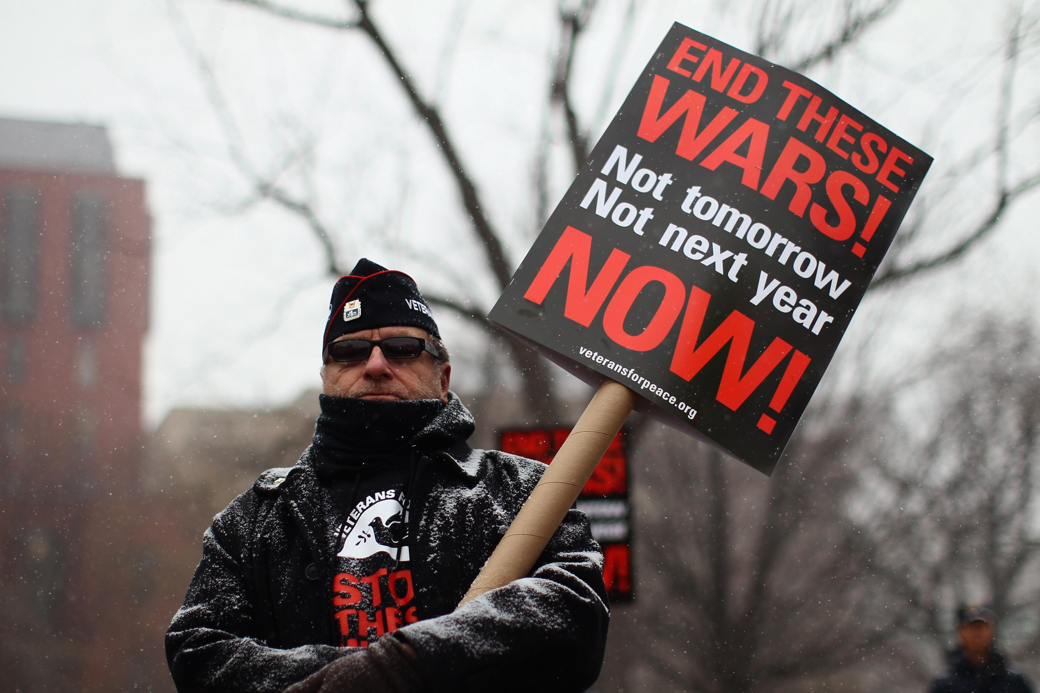 A veteran protests wars