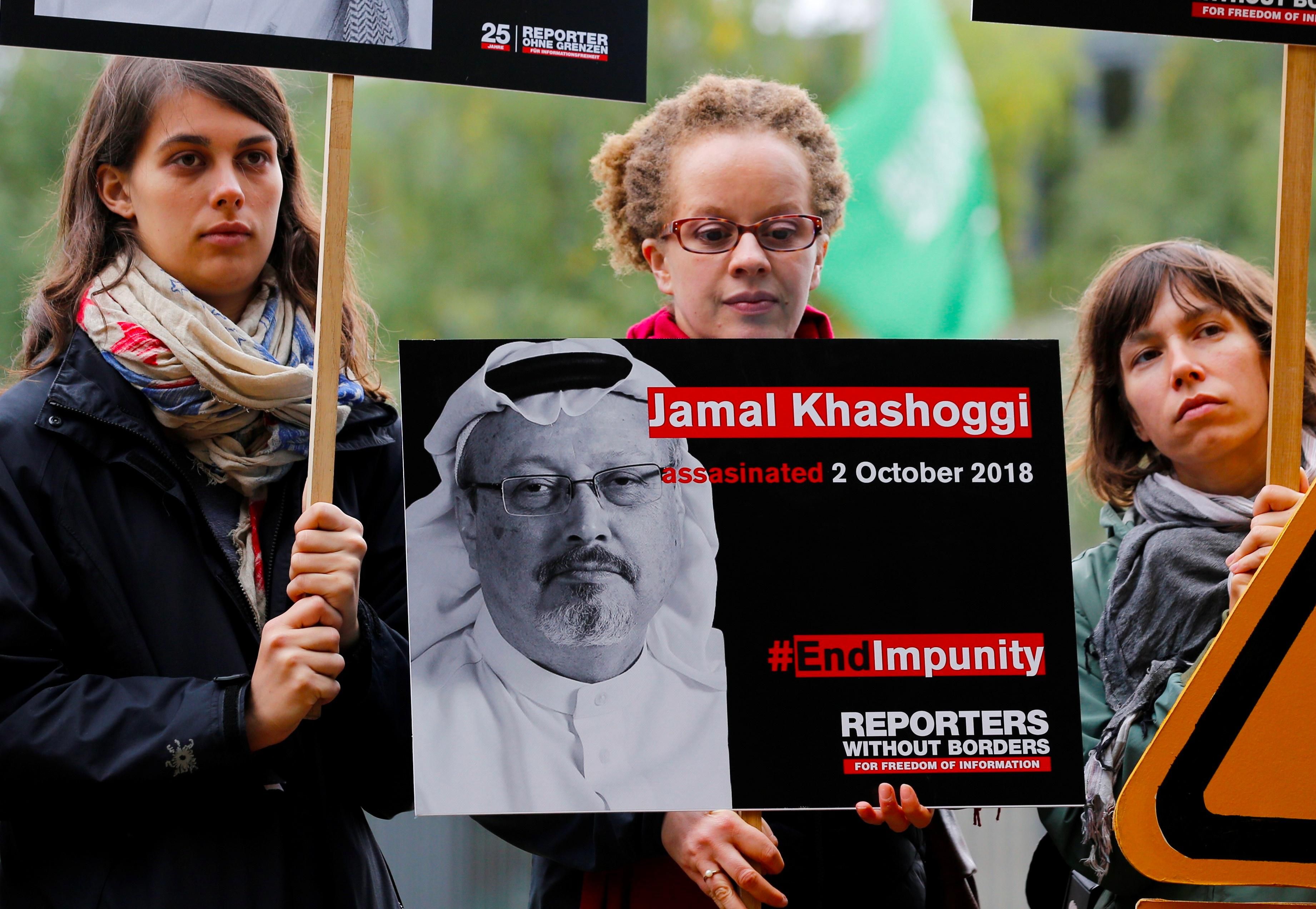 Protesters attend a vigil for Jamal Khashoggi