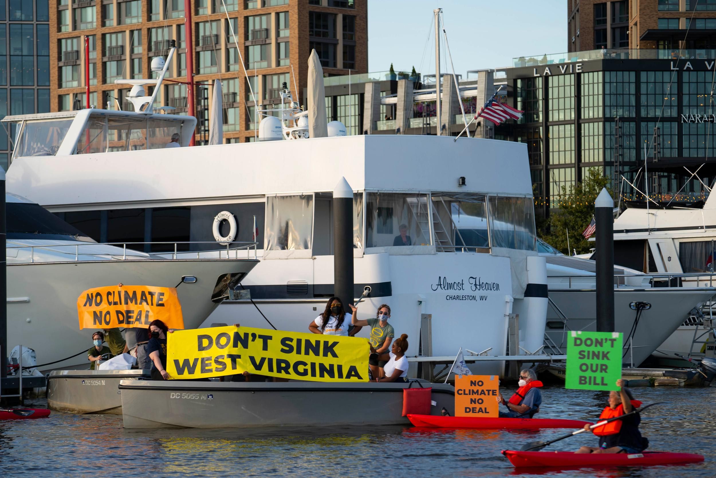 Flotilla protest in front of Manchin's yacht