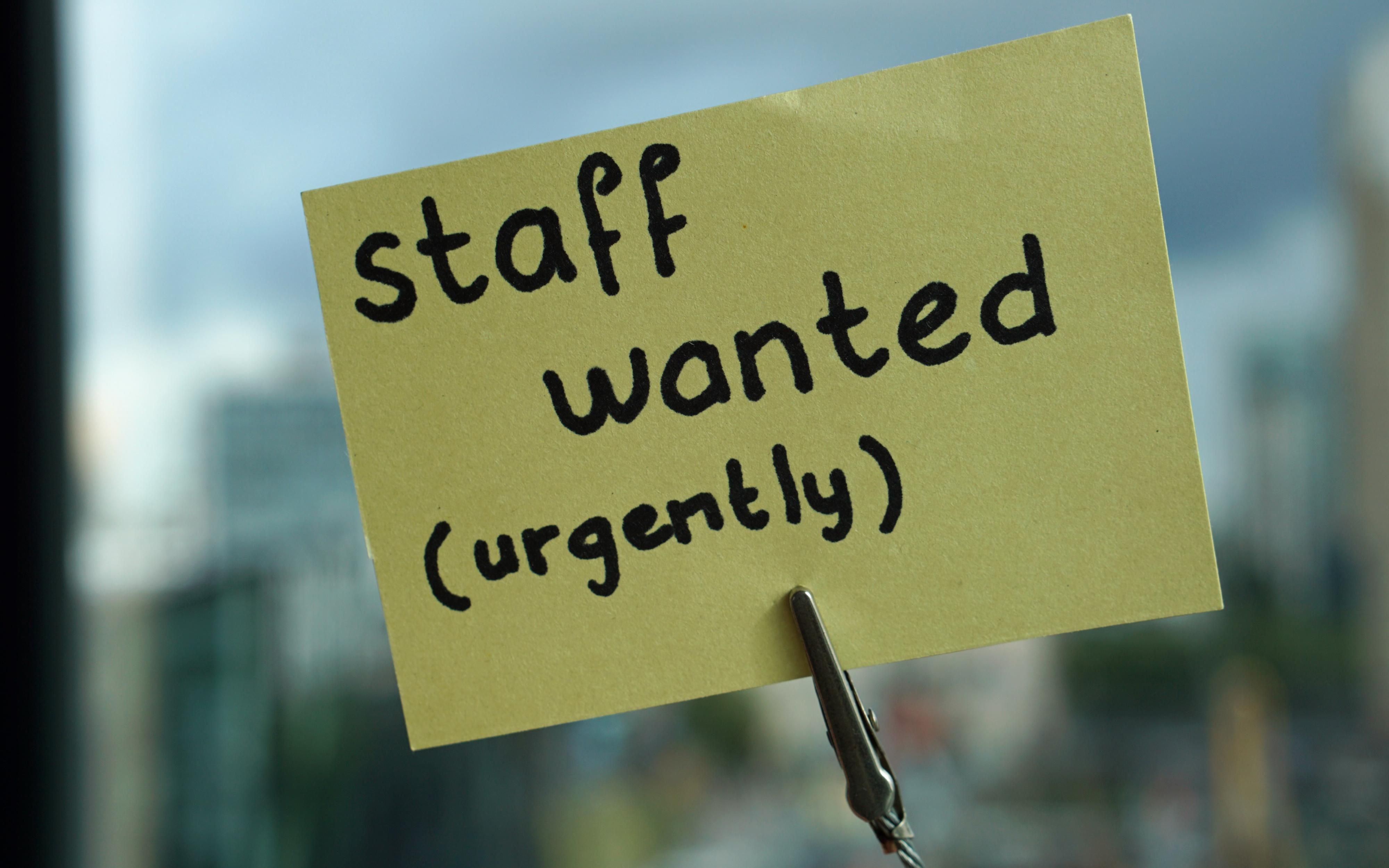 A staff wanted sign