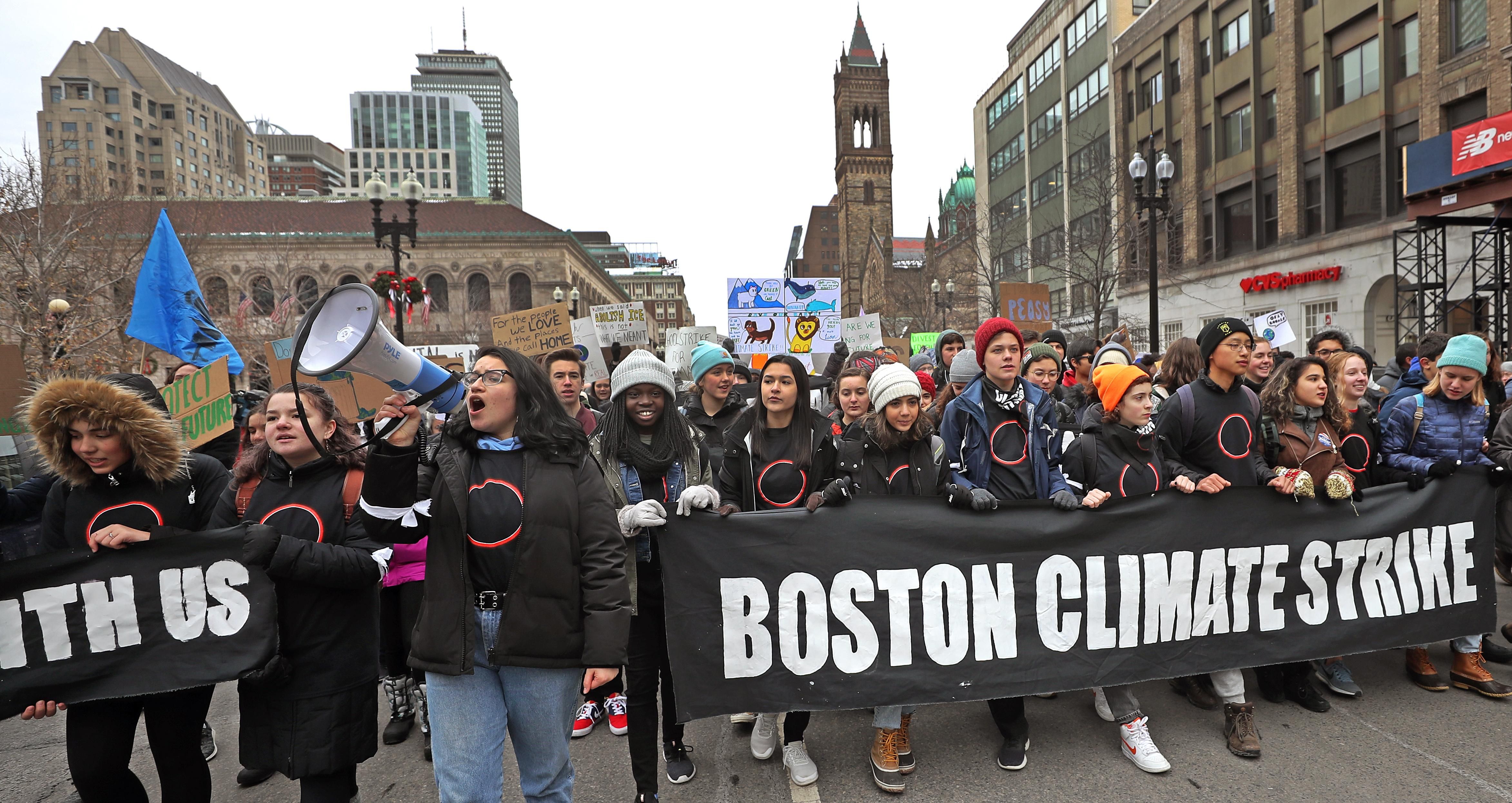 Protesters march from Copley Plaza to the Massachusetts State House in Boston to call for climate action on December 6, 2019. 