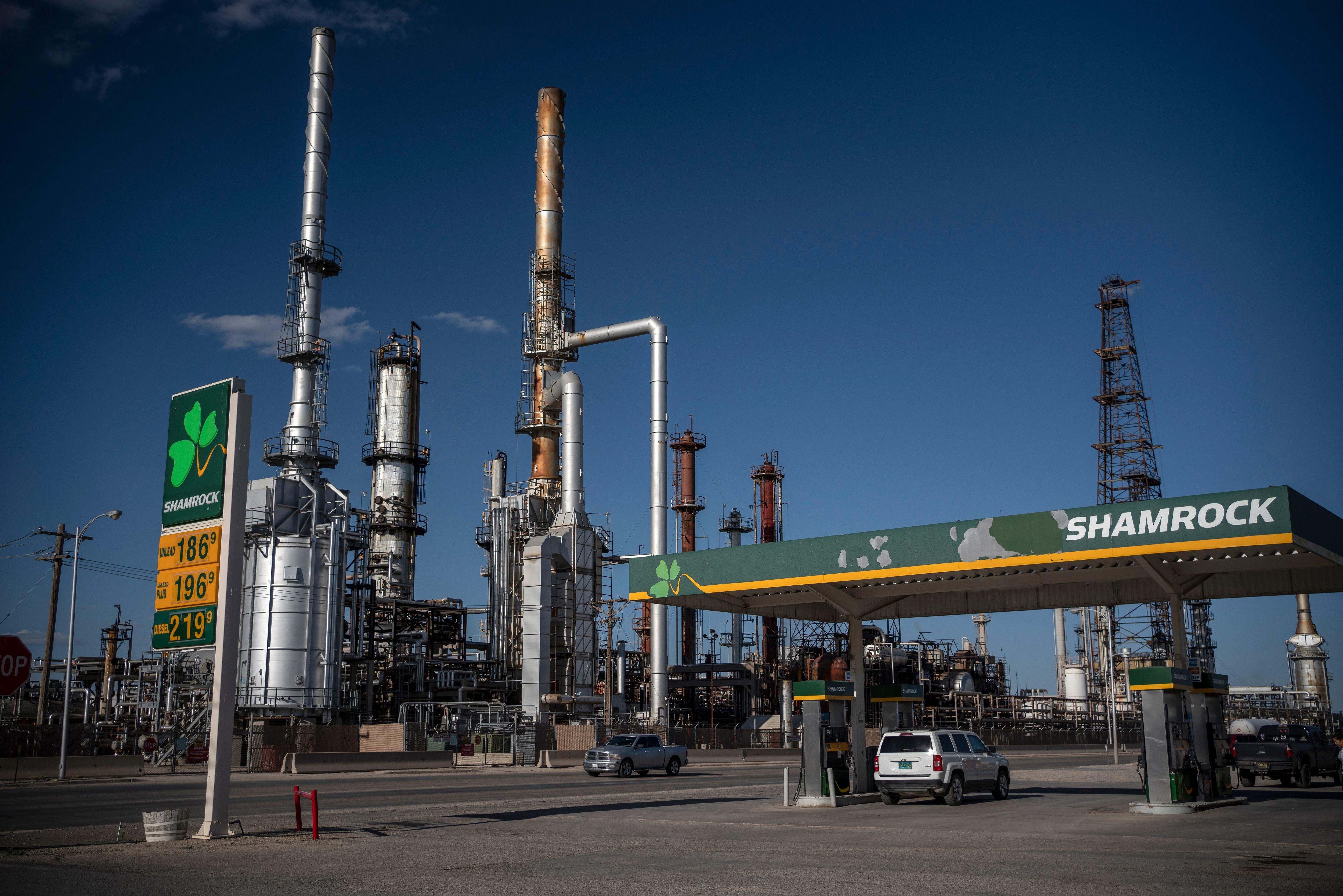 A gas station is pictured in front of Navajo Refining on April 23, 2020 in Artesia, New Mexico. (Photo: Paul Ratje/AFP via Getty Images)