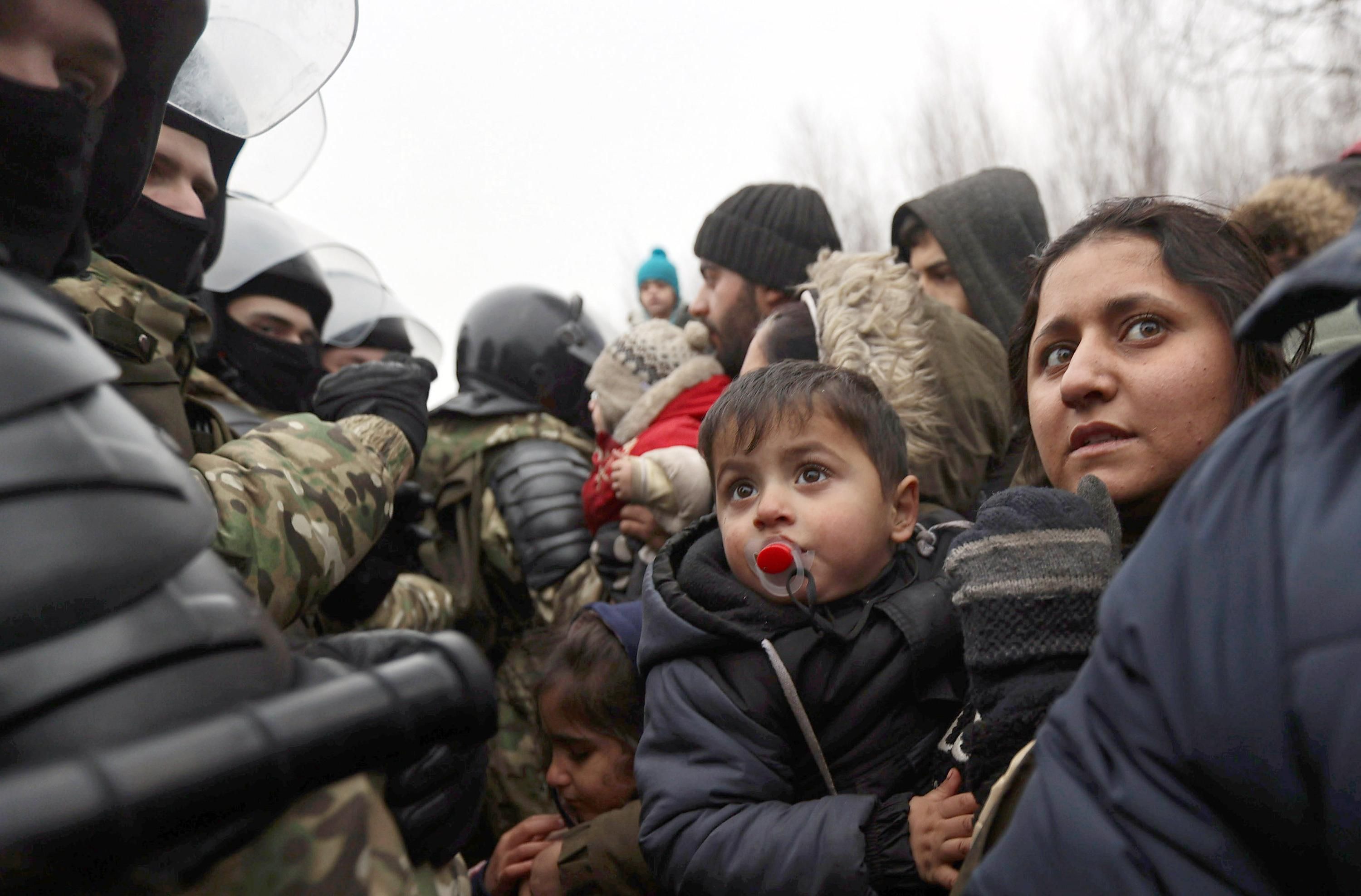 Migrants in a camp at the Polish border