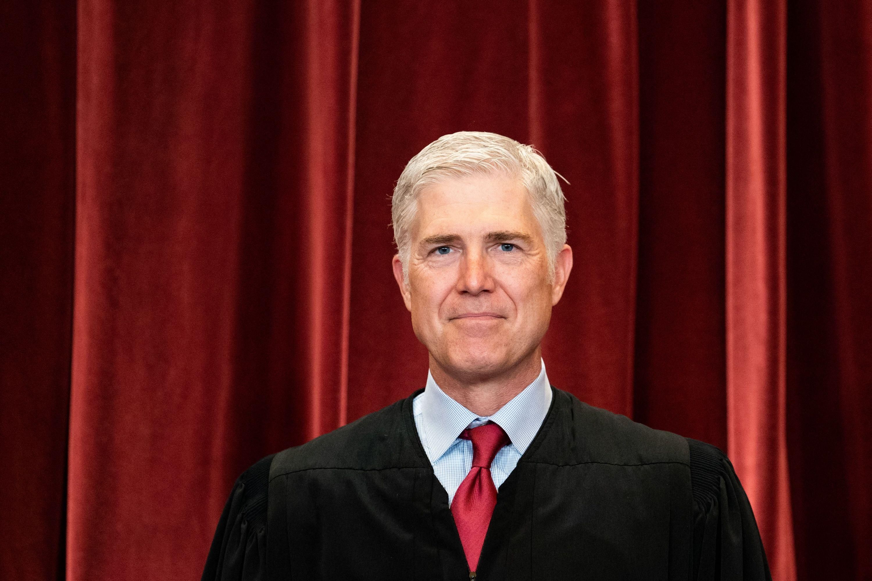 Associate Justice Neil Gorsuch stands during a group photo of the Justices at the Supreme Court in Washington, D.C. on April 23, 2021.
